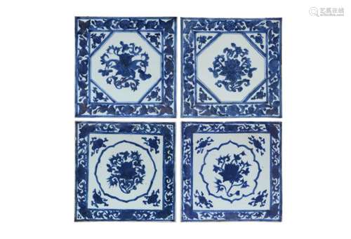 A pair of two blue and white porcelain tiles, decorated with...