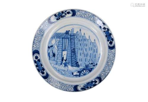 A blue and white porcelain plate with an image of the 'revol...