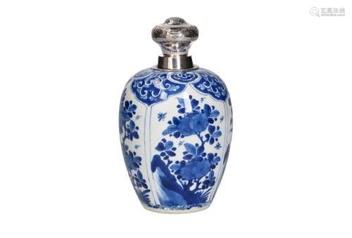 A blue and white porcelain tea canister with silver mounting...