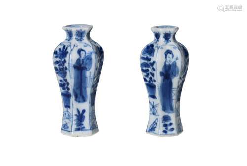 A pair of hexagonal blue and white porcelain vases, decorate...