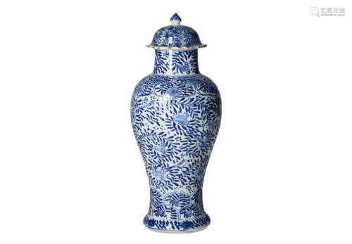 A blue and white porcelain lidded vase, decorated with flowe...