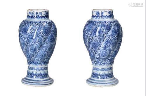 A pair of blue and white porcelain twisted vases, decorated ...