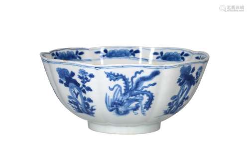 A blue and white porcelain lobed bowl, decorated with flower...