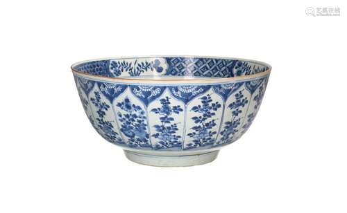 A blue and white porcelain bowl, decorated with reserves dep...