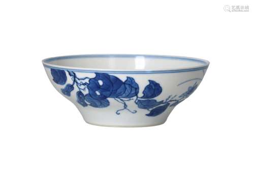 A blue and white porcelain bowl, decorated with leaves, inse...