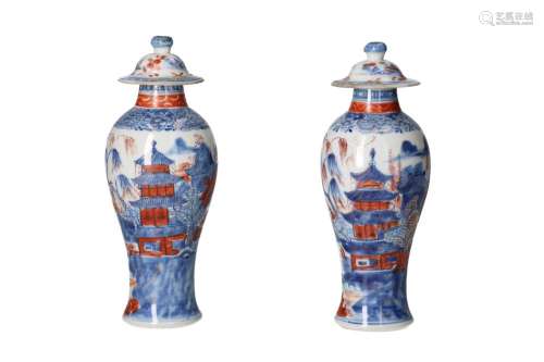 A pair of polychrome porcelain lidded miniature vases, decor...