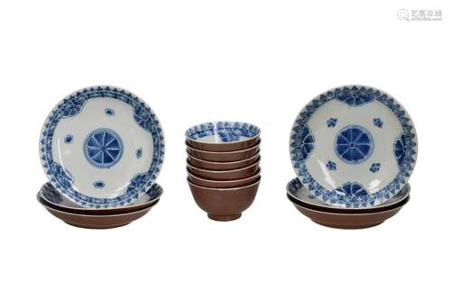 A set of six blue and white porcelain cups and saucers, the ...