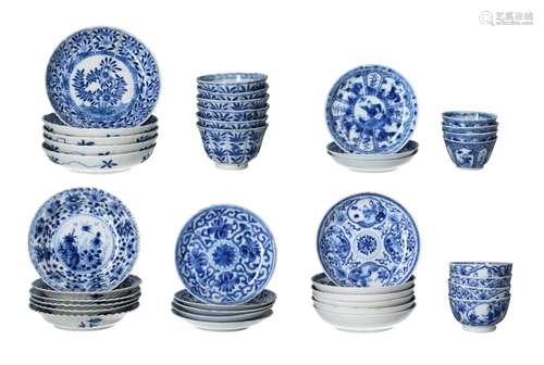 A diverse lot of blue and white porcelain objects, including...