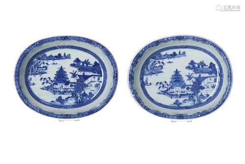 A pair of blue and white porcelain salad bowls, decorated wi...