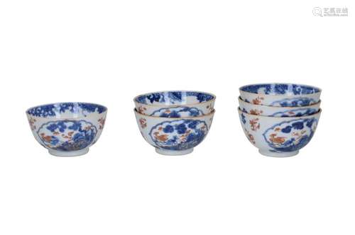 A set of six blue, white and red porcelain cups, decorated w...