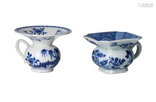 Lot of two blue and white porcelain spittoons, decorated wit...