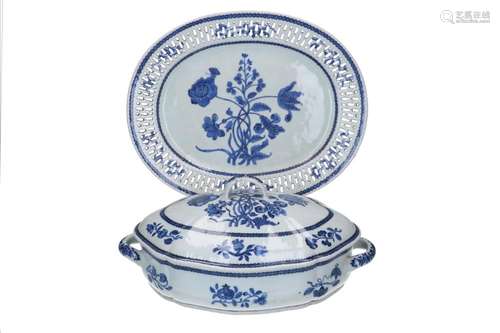 A blue and white linglong porcelain tureen on dish, decorate...