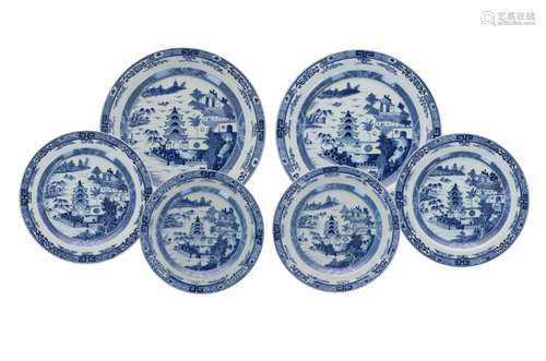 A set of six blue and white porcelain chargers, decorated wi...