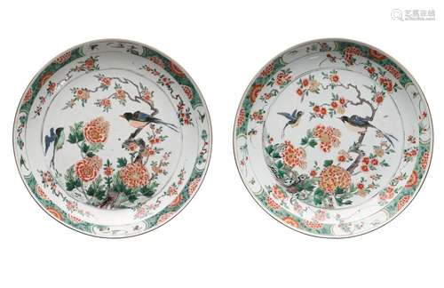 Two famille verte porcelain chargers, decorated with birds, ...