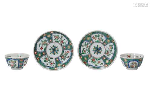 A set of two famille verte porcelain cups with saucers, deco...