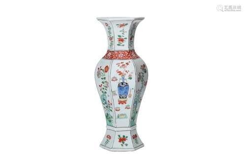 A hexagonal famille verte porcelain vase, decorated with flo...