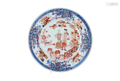 A polychrome Chine de commande porcelain charger, decorated ...