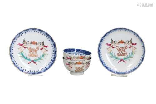 A pair of porcelain Chine de commande cups and saucers, with...