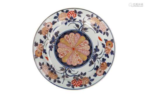 An Imari porcelain plate, decorated with flowers. Marked 'Jo...