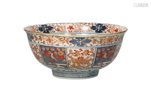 An Imari porcelain bowl with scalloped rim, decorated with f...