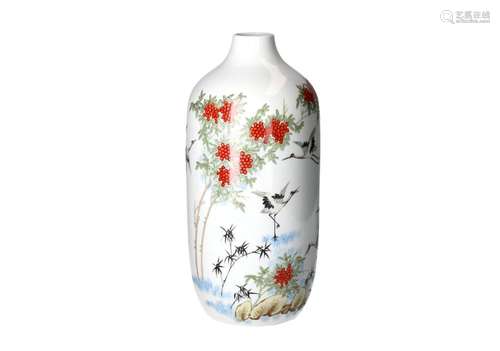 A polychrome porcelain vase, decorated with cranes, fruit tr...