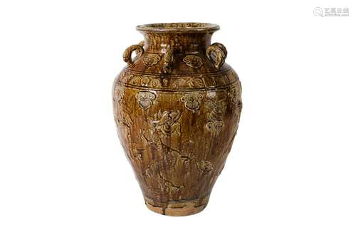 A glazed pottery martaban jar with six rings, decorated in r...