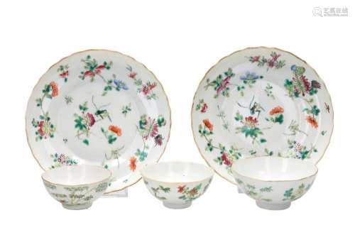 A pair of polychrome porcelain dishes with scalloped rim, de...