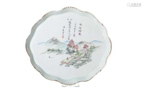 A polychrome porcelain tray, decorated with a mountainous ri...