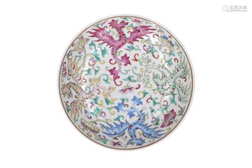 A polychrome porcelain deep dish, decorated with dragons and...