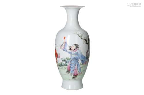 A polychrome porcelain vase, decorated with a boy serving te...