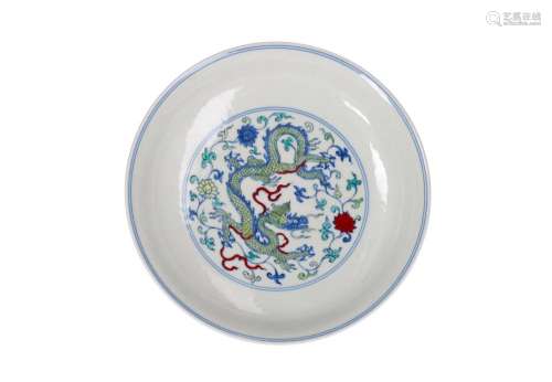A porcelain dish with raised rim and a wucai decoration of d...