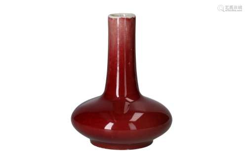 A sang de boeuf glazed porcelain vase. Unmarked. China, 18th...