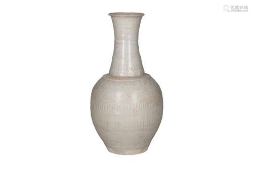 A Qingbai glazed porcelain bottle vase, decorated with flowe...