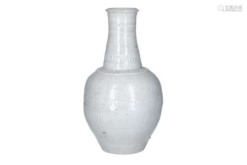 A Qingbai glazed porcelain bottle vase, decorated with flowe...