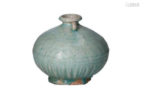 An azure blue stoneware vase with relief and small round ear...