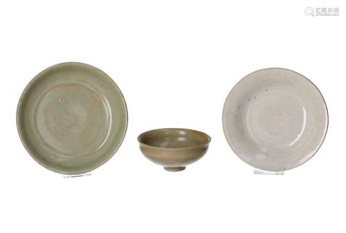 A Qingbai porcelain saucer, a greyish porcelain saucer and a...