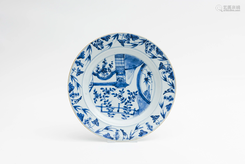 A blue and white floral decorated plate,