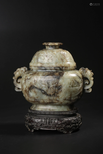 A grey jade carving of a censer and cover, carved in