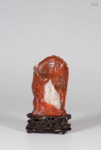 A red agate carving of a pavilion in a mountain Width