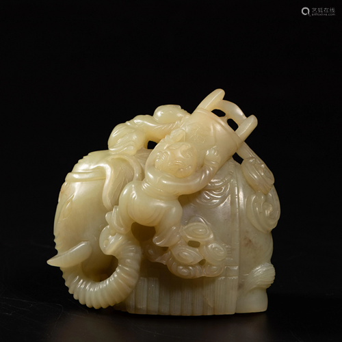 A Chinese yellow jade carving group depicting boys