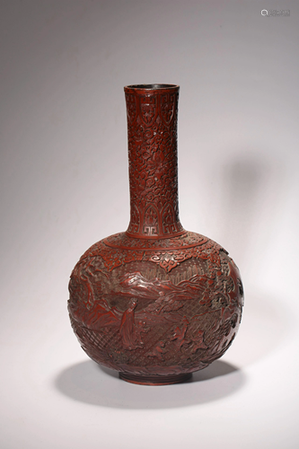 A Chinese cinnabar red lacquered bottle vase, Width 11