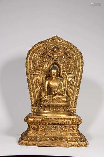 A Sino-Tibetan gilt bronze figure of Shakyamuni Buddha,