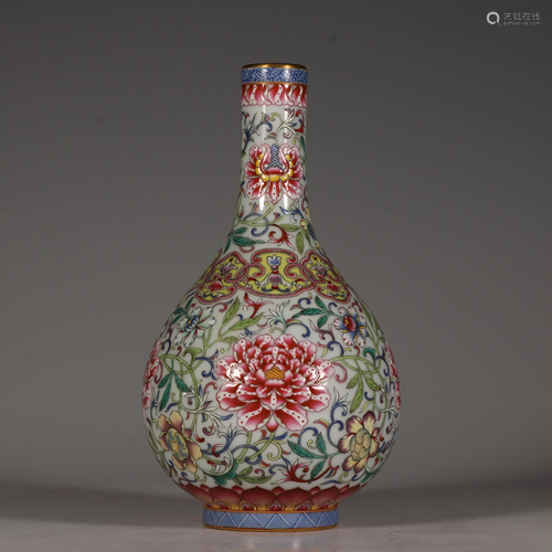 A famille rose floral bottle vase, with Qianlong mark,