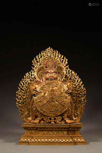 A gilt bronze six-armed Buddha, H 35 cm - Width 23 cm -