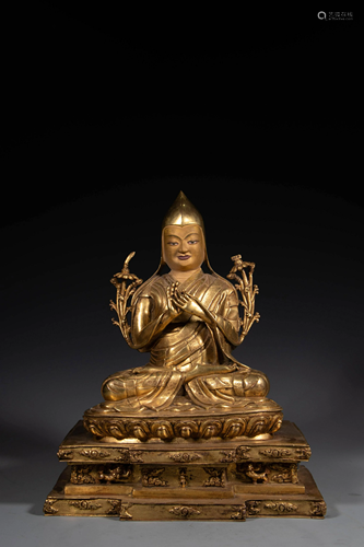 A Sino-Tibetan gilt bronze figure of Tsongkhapa, Ming