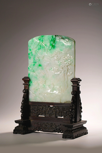 A Chinese emerald jade plaque, carved with scholars