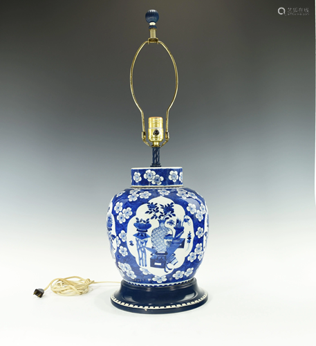 A LARGE CHINESE BLUE AND WHITE VASE CONVERTE…