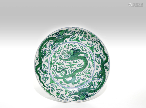 A CHINESE GREEN ENAMEL DRAGON DISH