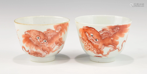 A PAIR OF CHINESE IRON RED LION CUPS