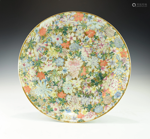 A LARGE CHINESE FAMILLE ROSE MILLEFLEURS PLATE